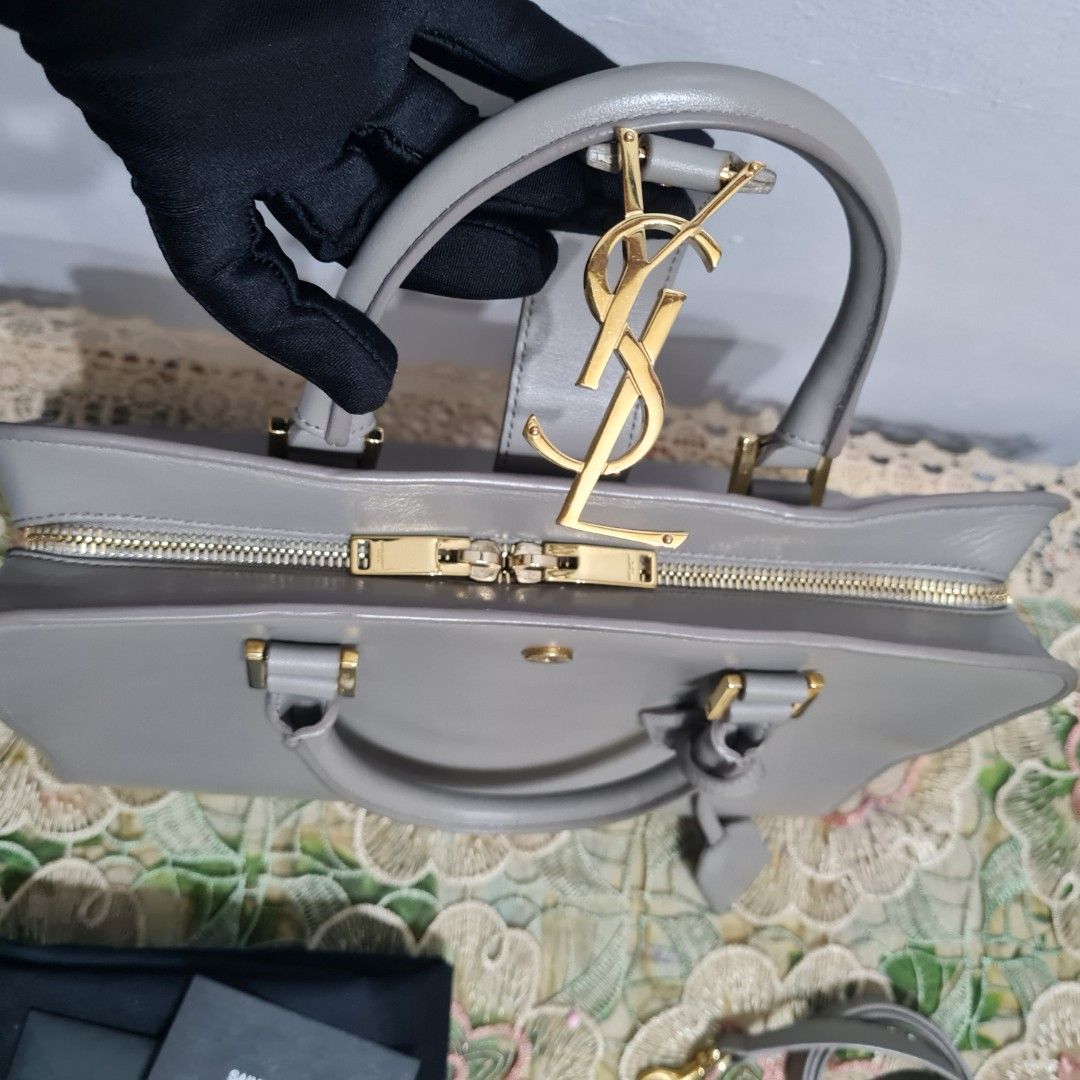 YSL Cabas Small (Category: Luxury Bags & Wallets) located in Santo Tomas. Submitted by averycassi01874 (Listing ID 1246368588, Image 3). Description: with strap, clochette, dust bag and care card.