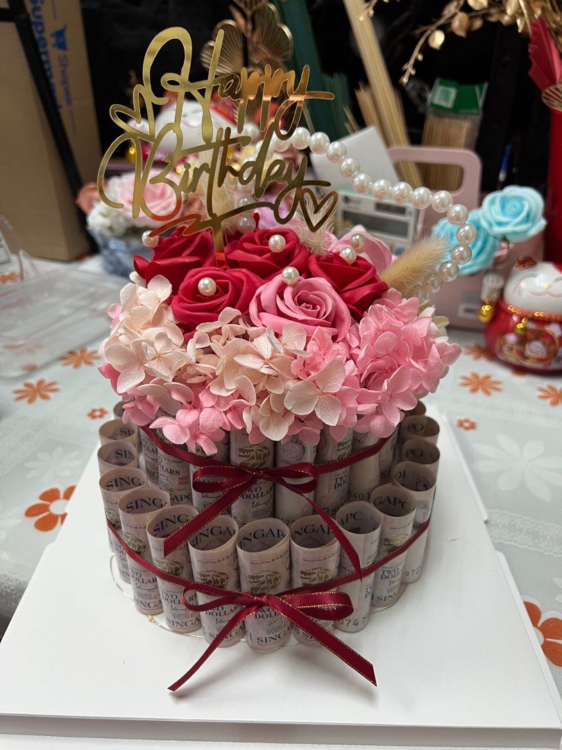 500gms / Half Kg Chocolate Truffle Cake + 10pcs Roses Bouquet + 16 Pcs
