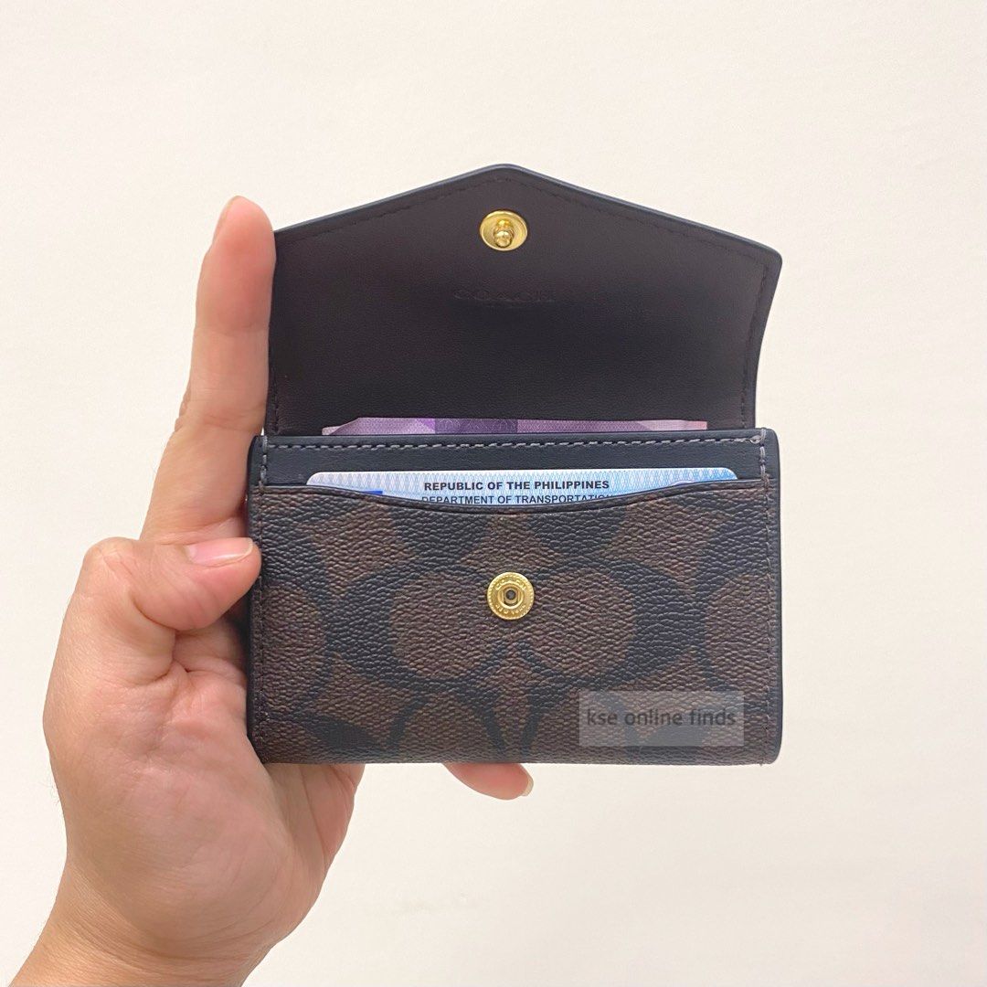 COACH Flap Card Case in Brown Black (Category: Luxury Bags & Wallets) located in Pasig City. Submitted by kseauthenticfinds (Listing ID 1226910421, Image 3). Description: COACH Flap Card Case in Brown Black 🇨🇦 Inclusion/s: tag and care card Pasig on hand Disclaimer‼️ KSE Online Finds is not associated or affiliated with any brand mentioned. All copyrights reserved to the original brand holders..