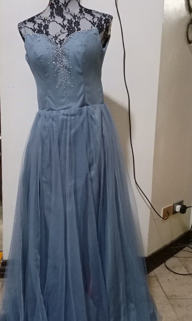 Dusty blue tulle gown (Category: Evening dresses & gowns) located in Manila. Submitted by DesignerDepotMNL (Listing ID 1241080040, Image 1). Description: bust 34-35 waist 26-27 hips 34-35.