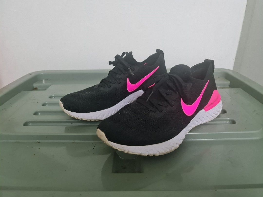 Nike Epic React (Category: Sneakers) located in Bangi. Submitted by ayip83 (Listing ID 1241032901, Image 2). Description: -Great condition 9.5/10 -Size 10.5US -The outsole and insole like new -No any scratch or torn -2 colours black and pink.