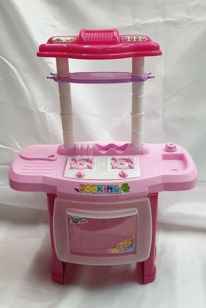 Oven Kitchen Toy (Category: Kids Toys) located in Quezon City. Submitted by ilovenystuff (Listing ID 1241022101, Image 1). Description: Oven kitchen Toy good condition with cooking set battery included.