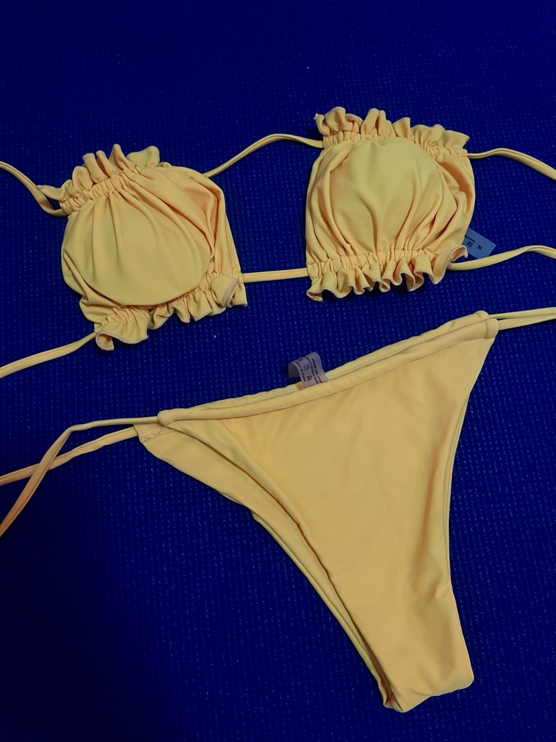 Two piece yellow bikini on Carousell