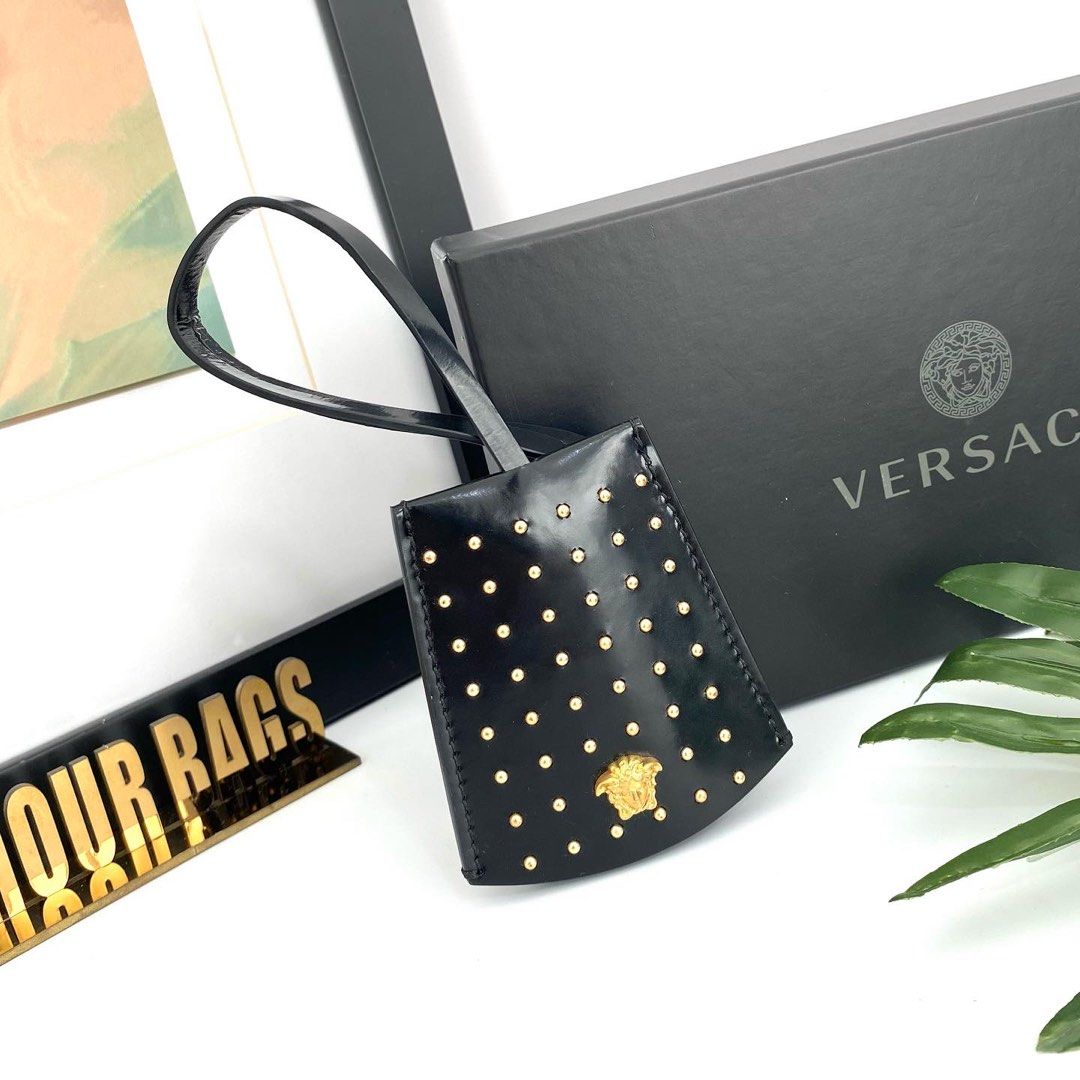 Versace luggage online tag