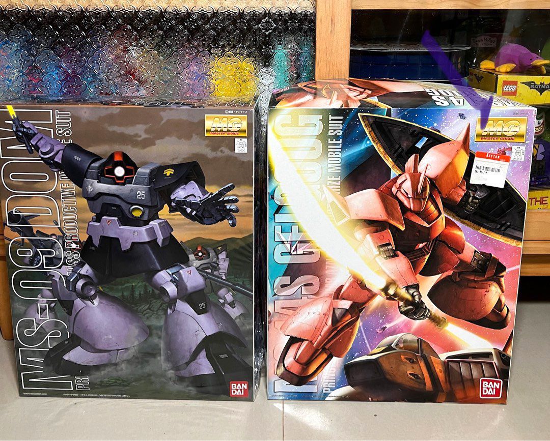 Bandai Hobby Dom Mobile Suit Gundam, Bandai MG 1/100 MS-09 Hobby Figure MG MS-14S GELGOOG (Category: Gundam Model Kits) located in Singapore. Submitted by Miss_Golden_Week (Listing ID 1212333509, Image 1). Description: gelgoog sold MG MS-09 DOM $69 MS-09 DOM, brand new, box opened, inside all small packs all sealed, perfect condition..