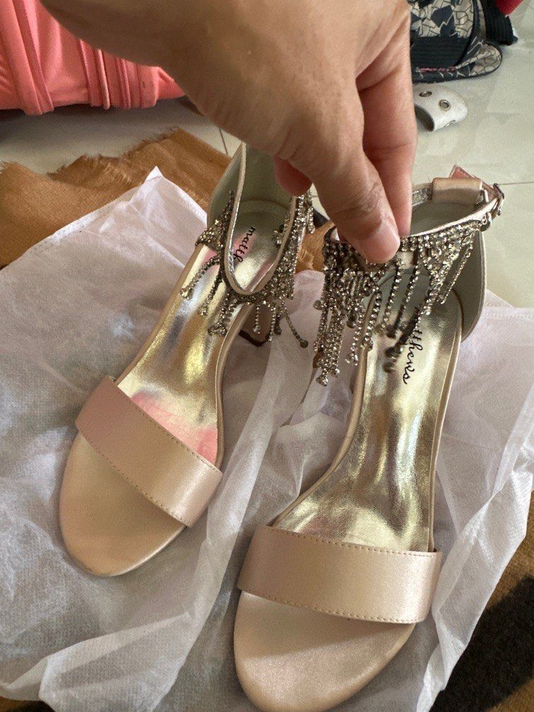 Bridal shoes (Category: Wedges) located in Marikina City. Submitted by chummybub (Listing ID 1241223114, Image 1). Description: Selling my limited edition Matthews shoes bridal collection - wore to my wedding ceremony for only an hour. Still have sole protective film, with box. Bought for 1999 selling for 1250.