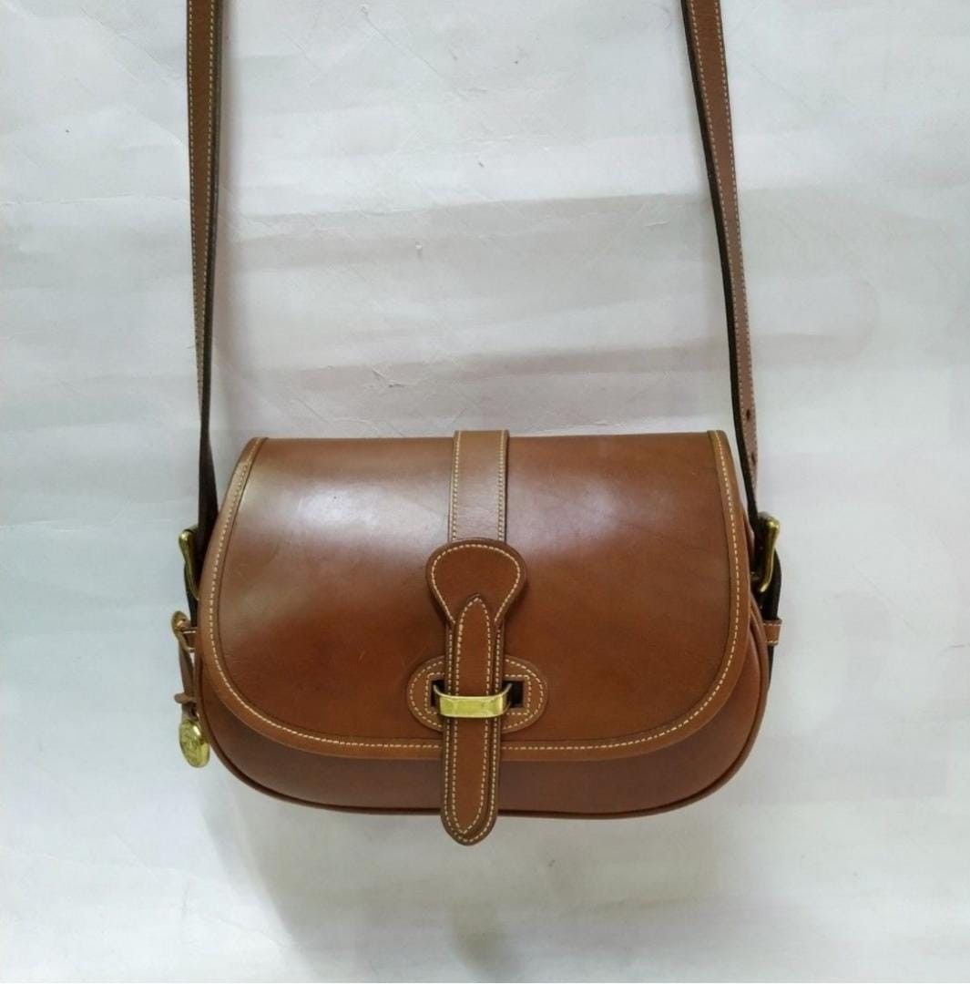 Dooney and bourke sling bags top