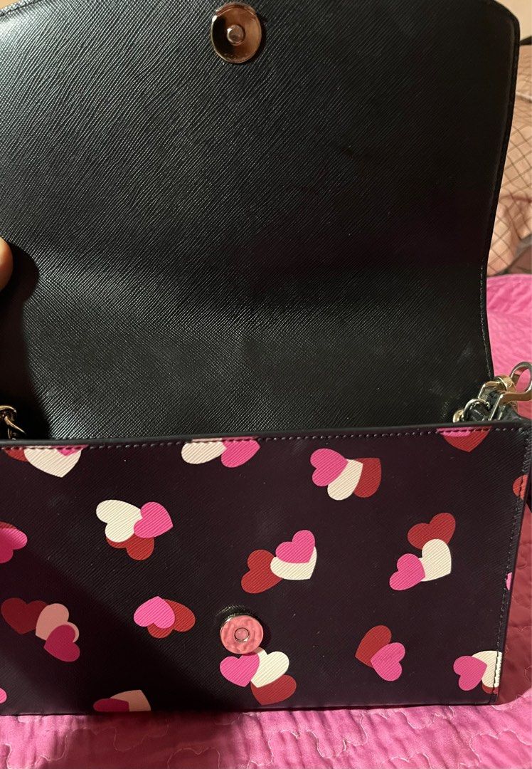 Kate Spade Carson Convertible Bag (Category: Luxury Bags & Wallets) located in Padre Garcia. Submitted by riailagan49560 (Listing ID 1241224028, Image 2). Description: Kate Spade Carson Flutter Hearts Printed Convertible Crossbody Black Multi Excellent Condition No visible sign of flaws or damages.