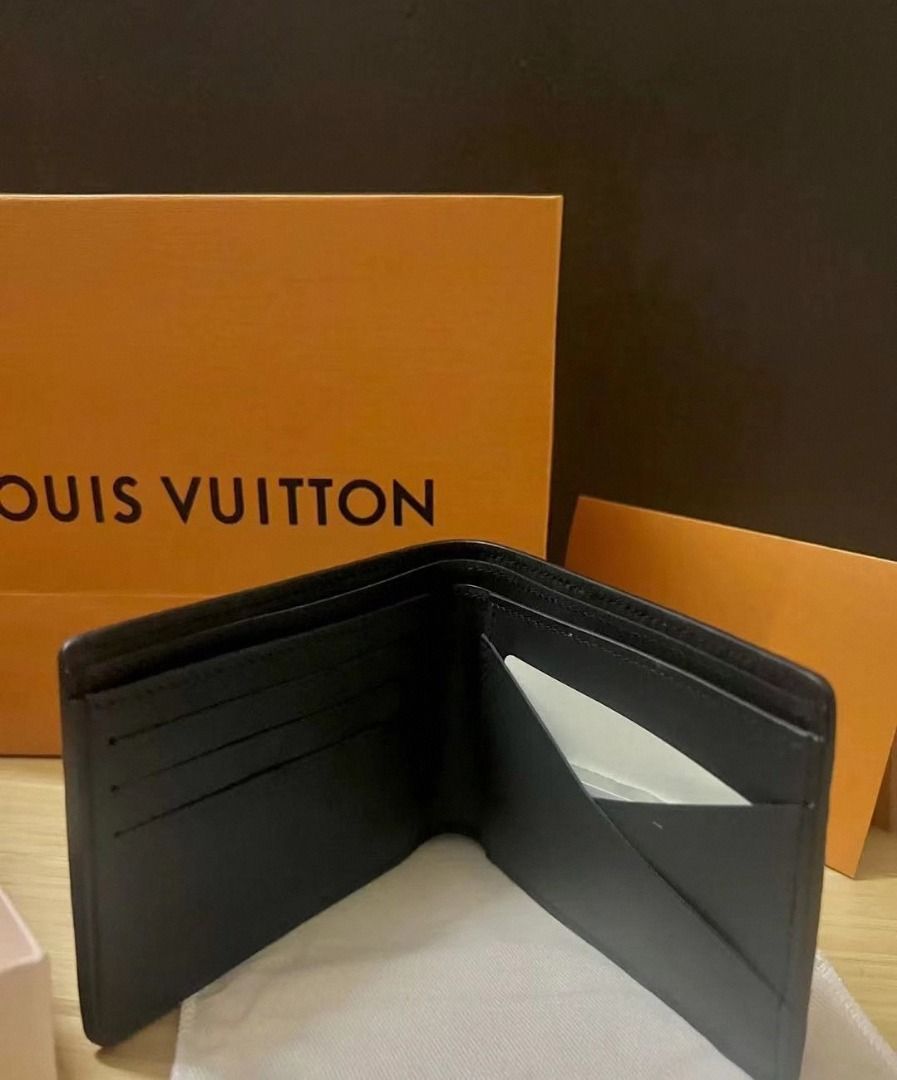 Louis Vuitton Black Classic Embossed Men's Double Fold Wallet, Men's  Fashion, Watches & Accessories, Wallets & Card Holders on Carousell