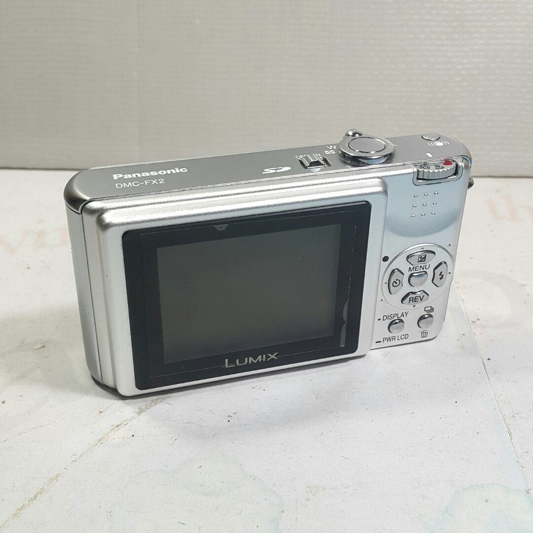 Lumix FX2 Vintage Vibe Leica lens (Category: Cameras) located in Paranaque City. Submitted by vintagepopsicle (Listing ID 1241360137, Image 2). Description: Lumix FX2 with Leica Lens. Rare and Cute with No Issues plus screen protector installed. This sale is for Camera Only. Tested with our test battery and SD Card. Just get new battery and SD card online, they are cheap. Gcash and Lalamove. Sold as is where is..