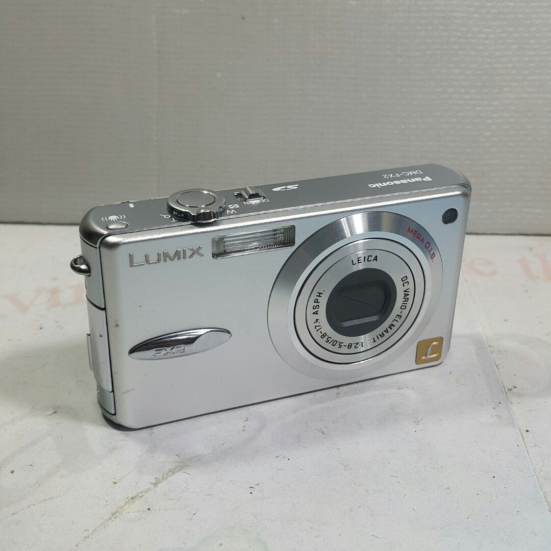 Lumix FX2 Vintage Vibe Leica lens (Category: Cameras) located in Paranaque City. Submitted by vintagepopsicle (Listing ID 1241360137, Image 1). Description: Lumix FX2 with Leica Lens. Rare and Cute with No Issues plus screen protector installed. This sale is for Camera Only. Tested with our test battery and SD Card. Just get new battery and SD card online, they are cheap. Gcash and Lalamove. Sold as is where is..