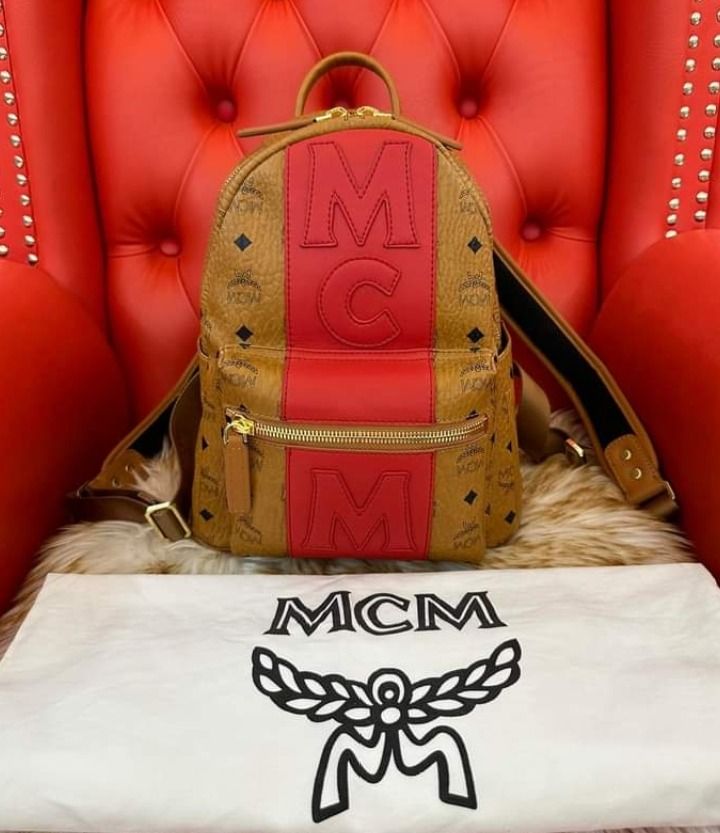 Mcm backpack on sale with red stripe