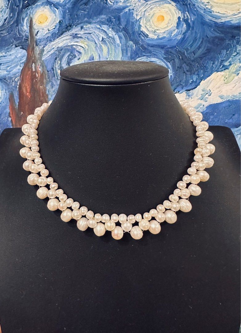 Multi strand woven pearl necklace