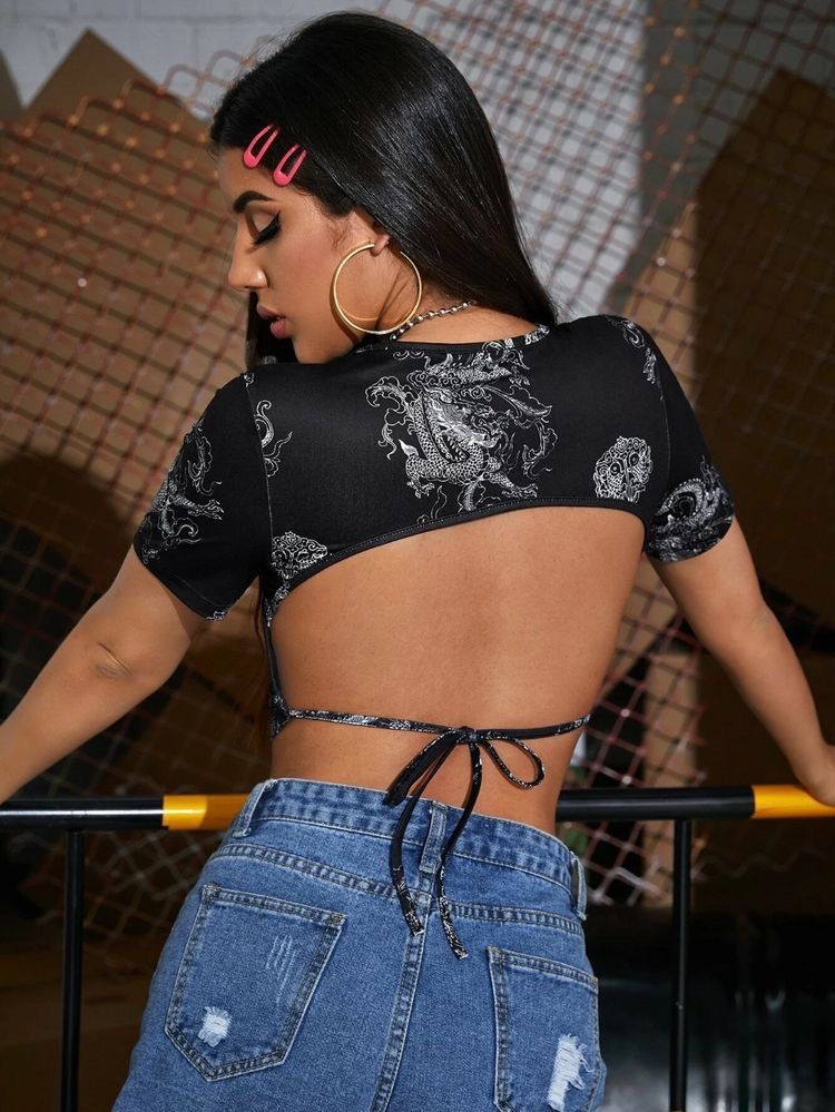SHEIN Black Dragon Backless Crop Top SHEIN (Category: Others Tops) located in Quezon City. Submitted by matrove (Listing ID 1225600085, Image 2). Description: Condition: 10/10! Size: XS-M Brand New, w/ Shein Pouch Nice Fabric Msg me for details and questions.