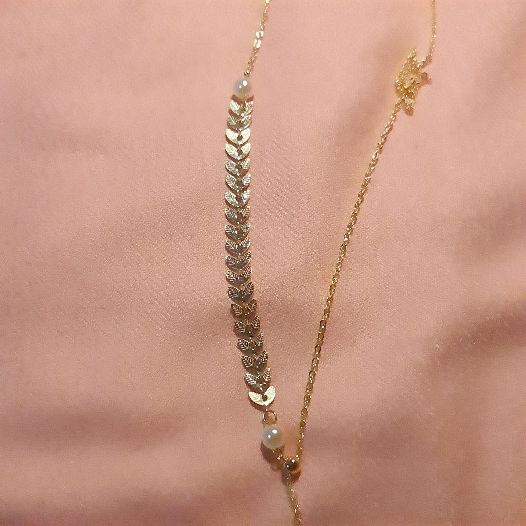 White pearl best sale gold chain designs