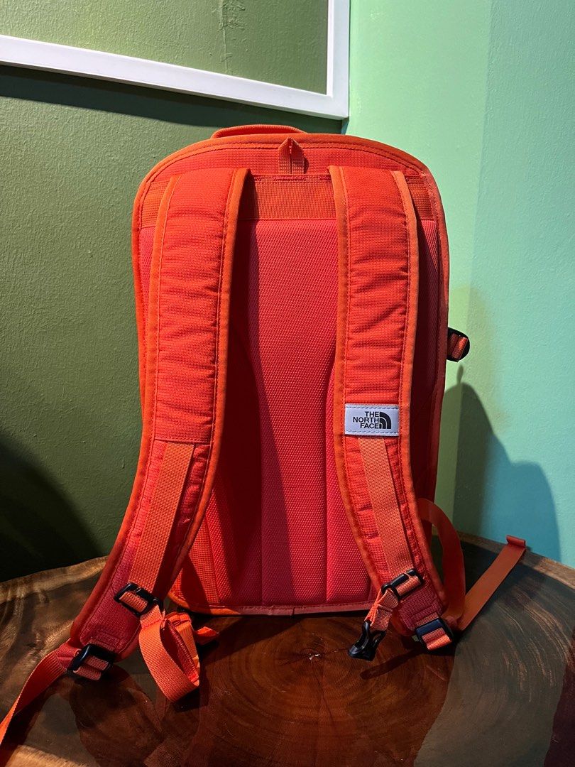 Orange north face backpack sales