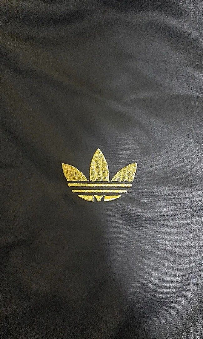 AUTHENTIC ADIDAS JACKET (Category: Coats, Jackets and Outerwear) located in Singapore. Submitted by blubdubdub (Listing ID 1241231925, Image 2). Description: VINTAGE ADIDAS JACKET SALE: - UP: $99 - Lightly used, still in good condition - Size L - Has a cool adidas logo zipper, cool colour combination contrast as well -delivery available for $3.