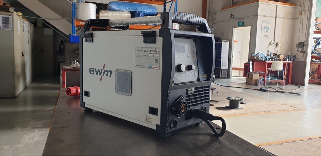 welding machine (Category: Home Improvement Tools & Accessories) located in Singapore. Submitted by andrewanghs (Listing ID 1241268478, Image 2). Description: Brand: EWM Model: Picomig 305 D3 Puls TKG PRODUCTS DESCRIPTION MIG/MAG pulse multi-process First-class EWM welding technology: Efficiency and the sustainable use of resources are the key features of our multiprocess MIG/MAG welding machines. In doing so, the controlled, short circuit-proof 