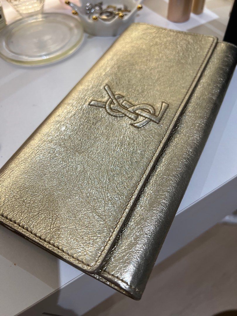 YSL gold clutch bag Luxury Bags Wallets on Carousell