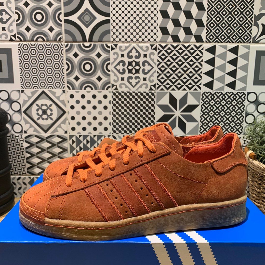 Adidas superstar on sale suede orange
