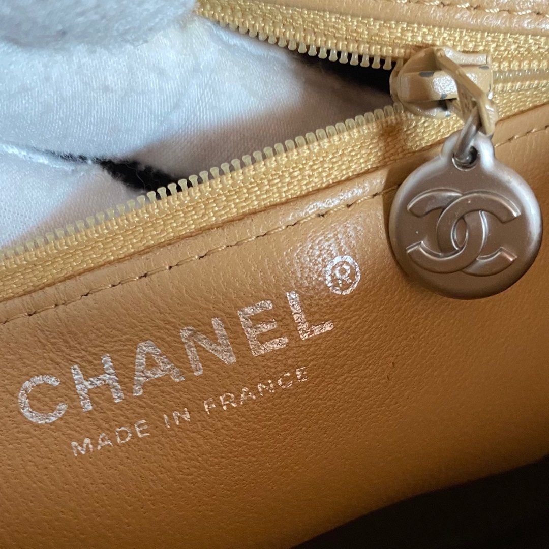Authentic Preloved Chanel Caviar Medallion Tote in Beige with Silver  Hardware, Luxury, Bags & Wallets on Carousell