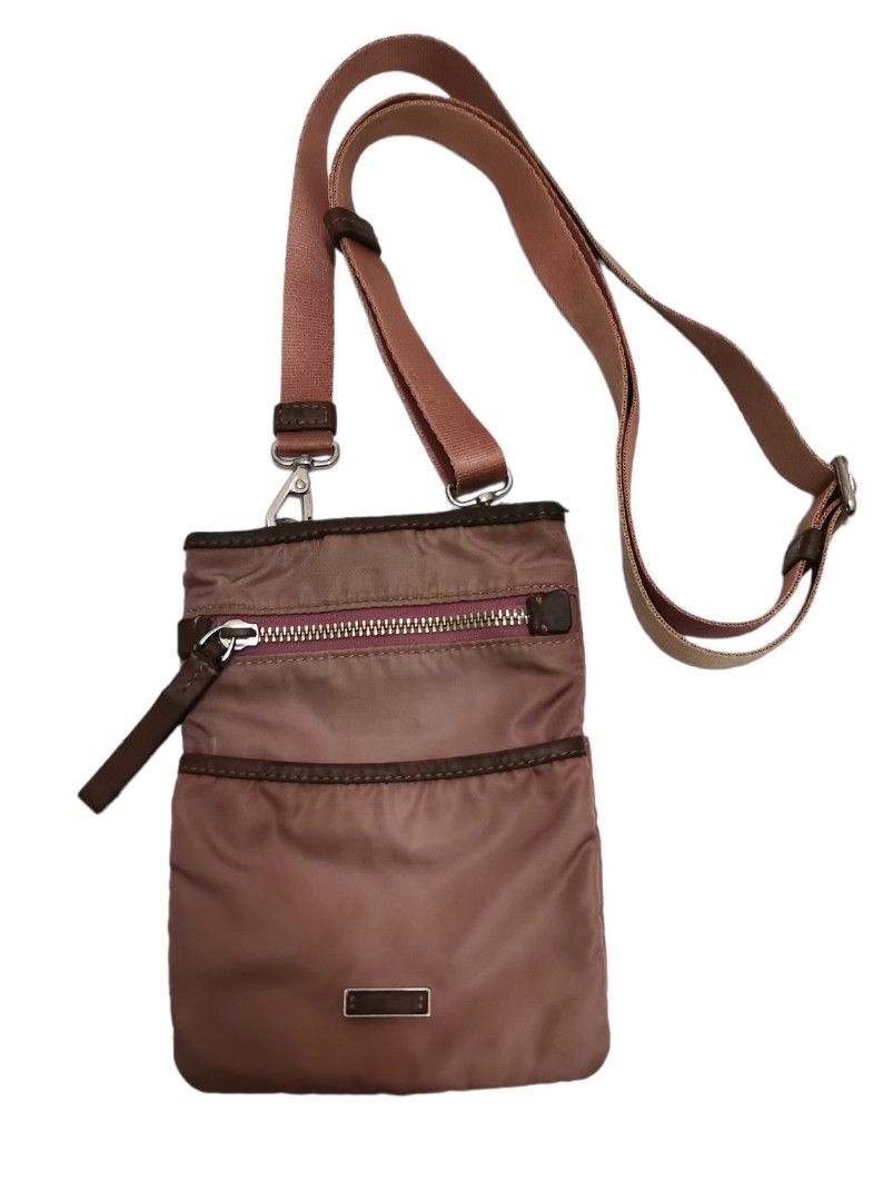 Tumi small outlet sling bag