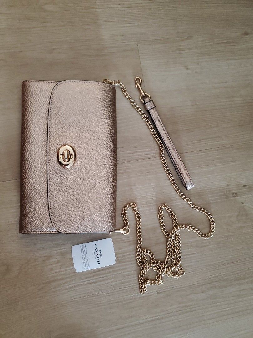 Coach purse rose gold hotsell