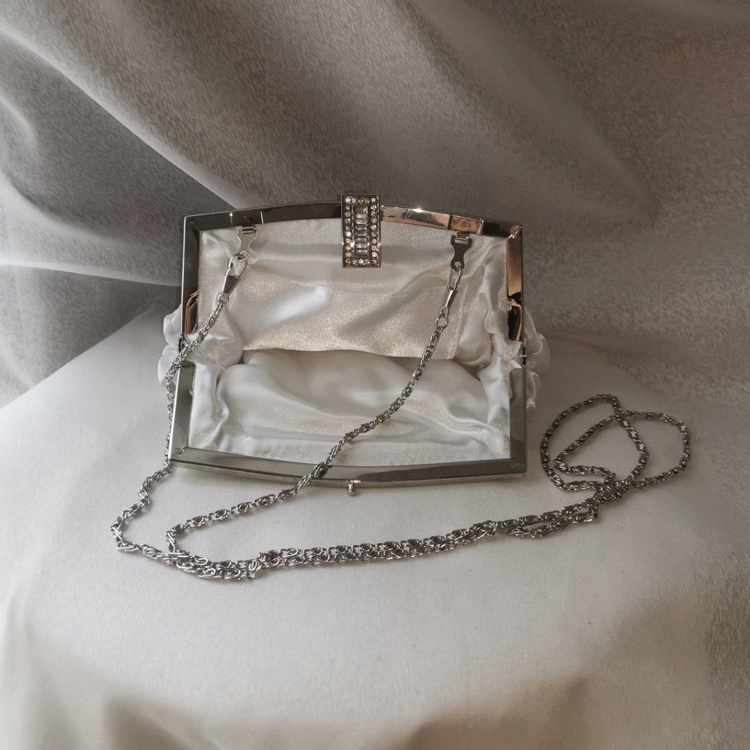 Ivory and silver clutch store bag