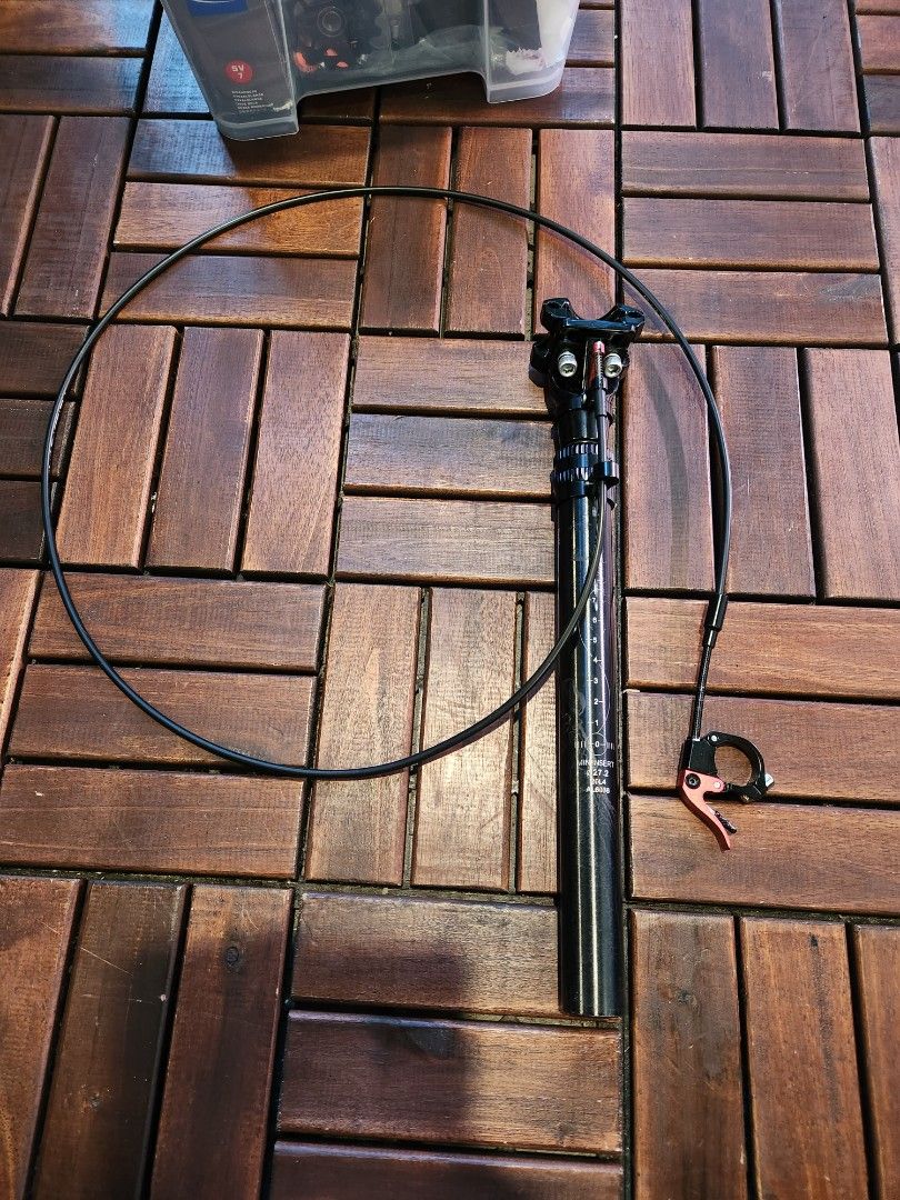 Gub dropper post top