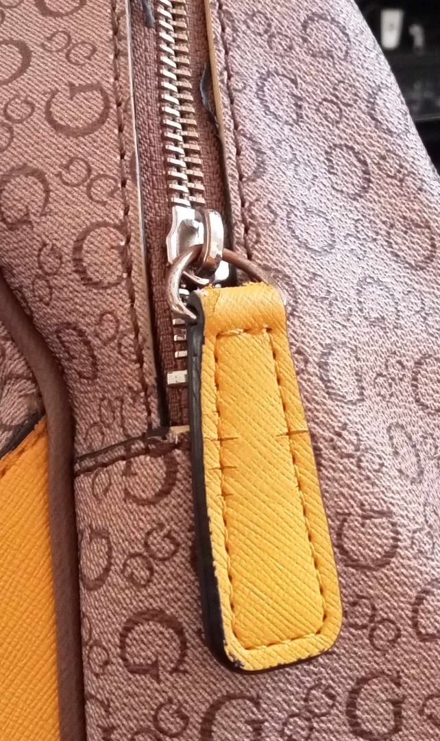 original GUESS Women's Logo Backpack Signature Brown/ Yellow on Carousell