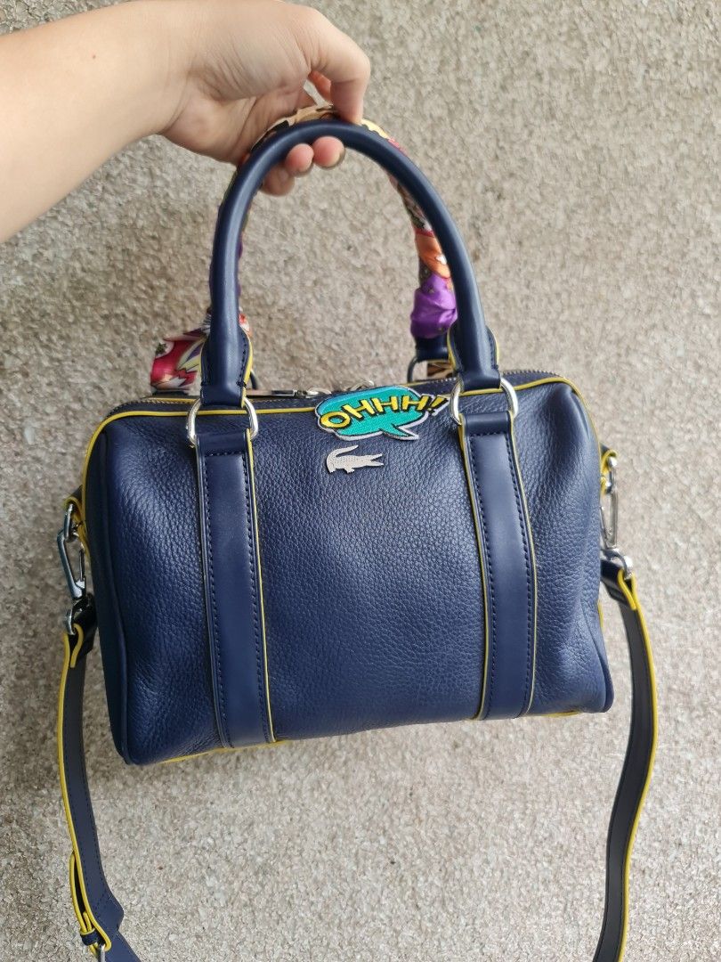 Lacoste (Category: Luxury Bags & Wallets) located in Butuan. Submitted by yangzzzverzosa (Listing ID 1241448431, Image 2). Description: free boston bag my issue sa handle lacoste kili bag minimal signs of wear original lacoste.