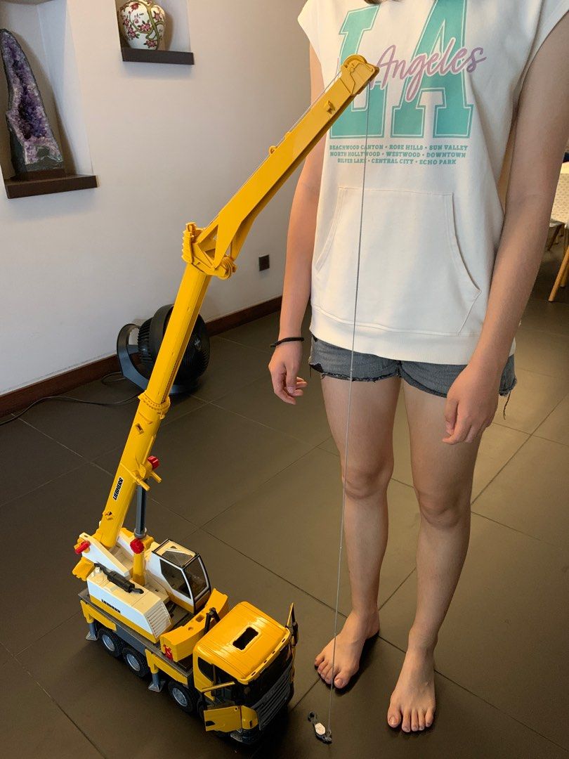 Liebherr toy crane hobbies toys toys games on carousell