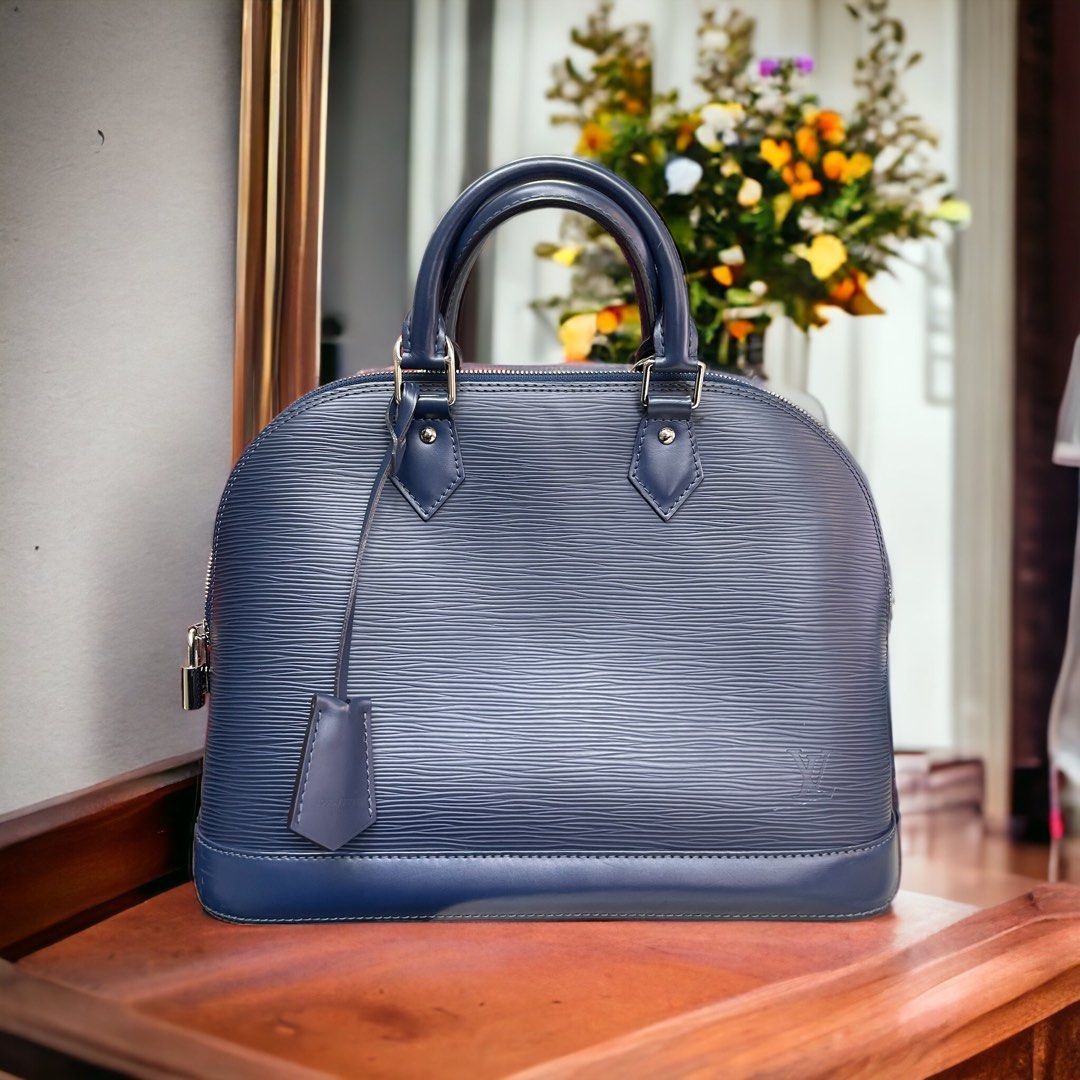 LV Alma Mini Bag Epi Leather Louis Vuitton, Luxury, Bags & Wallets on  Carousell