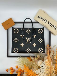 Louis Vuitton LV Monogram Empreinte Onthego MM Handbag Turtledove $3,400