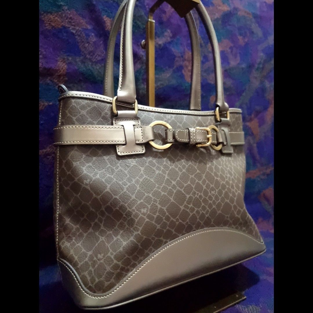 Nina Ricci Monogram Mini Tote Bag (Category: Luxury Bags & Wallets) located in Rizal. Submitted by roccini (Listing ID 1241475108, Image 2). Description: Nina Ricci Monogram Mini Tote Bag -Authentic Moneyback Guaranteed -Gold Hardwares -YKK Zippers -Has back compartment in YKK Zip -Main compartment has 2 open compartments, 1 mid compartment in zip closure. With 1 side compartment in YKK zip -Dimension is approximately 12.5"L x 4.5"W x 8"H. Handle