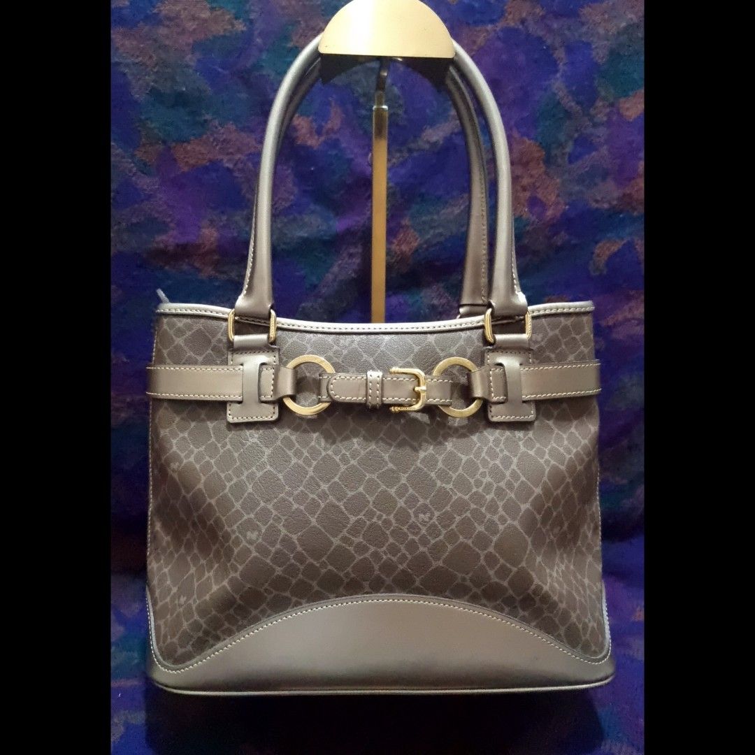 Nina Ricci Monogram Mini Tote Bag (Category: Luxury Bags & Wallets) located in Rizal. Submitted by roccini (Listing ID 1241475108, Image 1). Description: Nina Ricci Monogram Mini Tote Bag -Authentic Moneyback Guaranteed -Gold Hardwares -YKK Zippers -Has back compartment in YKK Zip -Main compartment has 2 open compartments, 1 mid compartment in zip closure. With 1 side compartment in YKK zip -Dimension is approximately 12.5"L x 4.5"W x 8"H. Handle