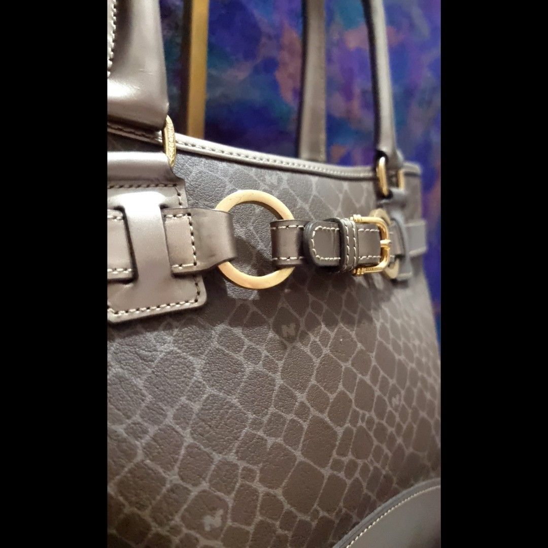 Nina Ricci Monogram Mini Tote Bag (Category: Luxury Bags & Wallets) located in Rizal. Submitted by roccini (Listing ID 1241475108, Image 3). Description: Nina Ricci Monogram Mini Tote Bag -Authentic Moneyback Guaranteed -Gold Hardwares -YKK Zippers -Has back compartment in YKK Zip -Main compartment has 2 open compartments, 1 mid compartment in zip closure. With 1 side compartment in YKK zip -Dimension is approximately 12.5"L x 4.5"W x 8"H. Handle