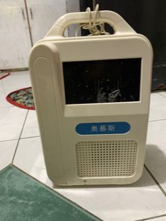 Portable oxygen and transportable oxygen concentrator