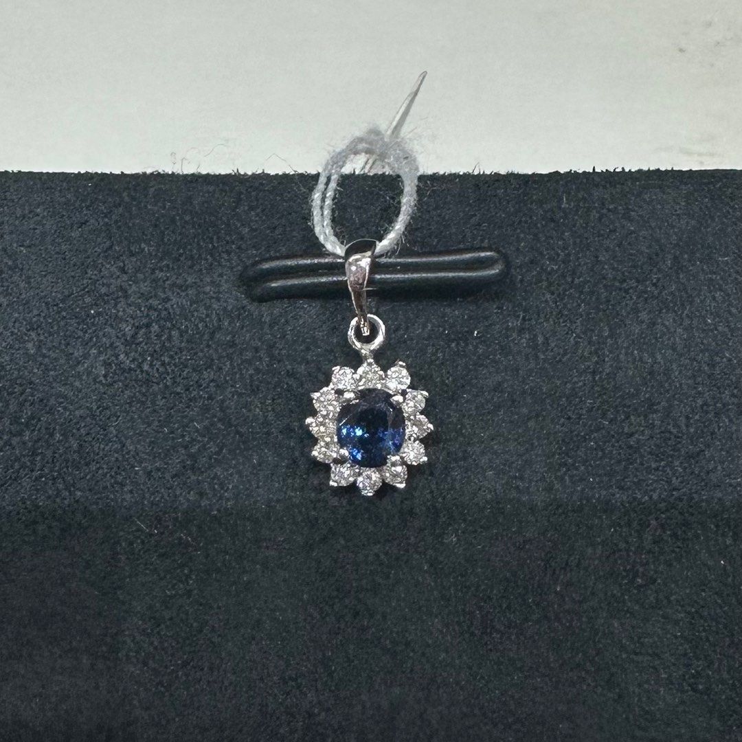 White gold necklace store with sapphire pendant