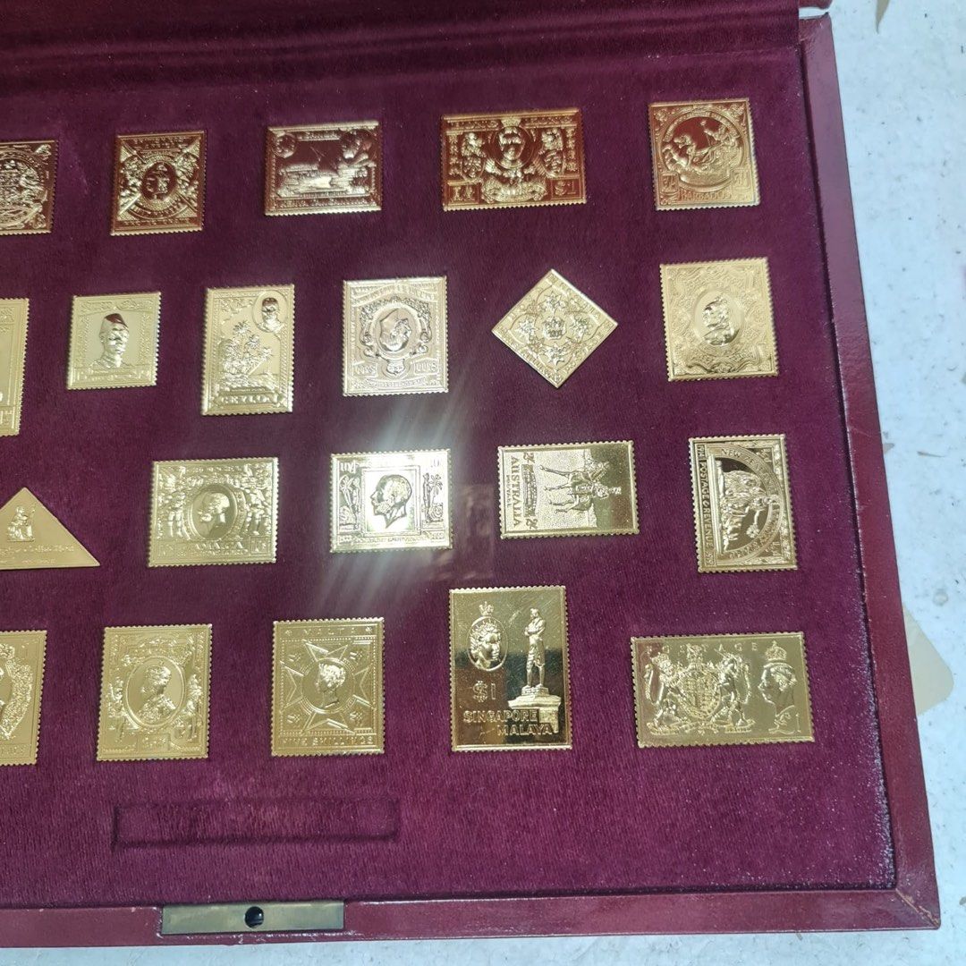 The empire collection, 925 silver , gold plated metal stamps. 25 pieces