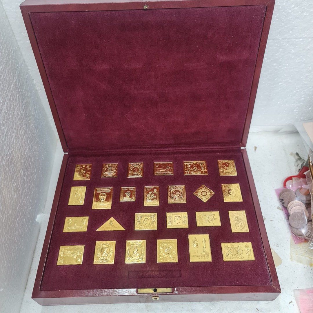 The empire collection, 925 silver , gold plated metal stamps. 25 pieces