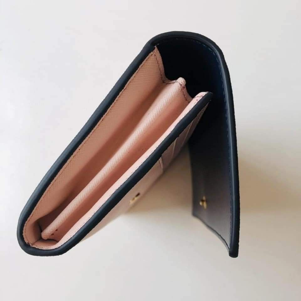 Tory Burch Robinson Envelope Continental Wallet (Category: Wallets & Card holders) located in Manila. Submitted by stacey_lopez922 (Listing ID 1241422682, Image 2). Description: Tory Burch Robinson Envelope Continental Wallet (with box and paperbag) - 8” W x 4” H x 1” D - logo medallion at the flap - scratch resistant leather - accordion interior and interior zip - slip currency pockets and 12 card slots.