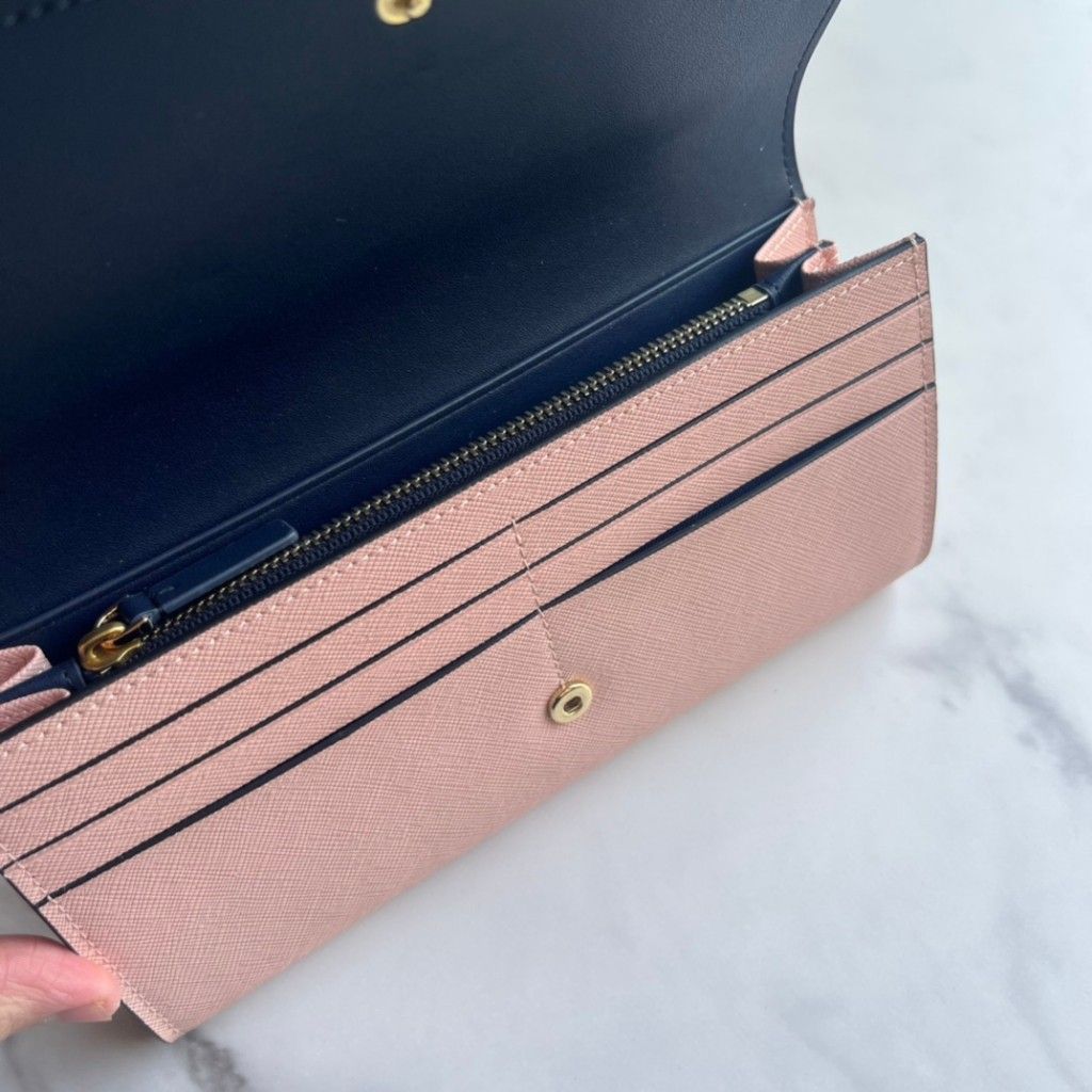 Tory Burch Robinson Envelope Continental Wallet (Category: Wallets & Card holders) located in Manila. Submitted by stacey_lopez922 (Listing ID 1241422682, Image 3). Description: Tory Burch Robinson Envelope Continental Wallet (with box and paperbag) - 8” W x 4” H x 1” D - logo medallion at the flap - scratch resistant leather - accordion interior and interior zip - slip currency pockets and 12 card slots.