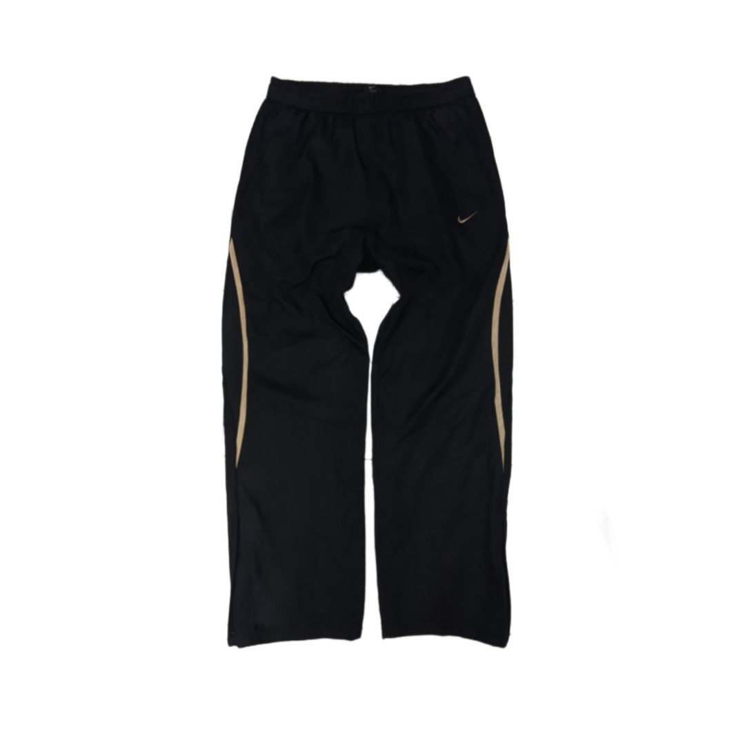 Y2k Nike track pants, Men's Fashion, Bottoms, Joggers on Carousell