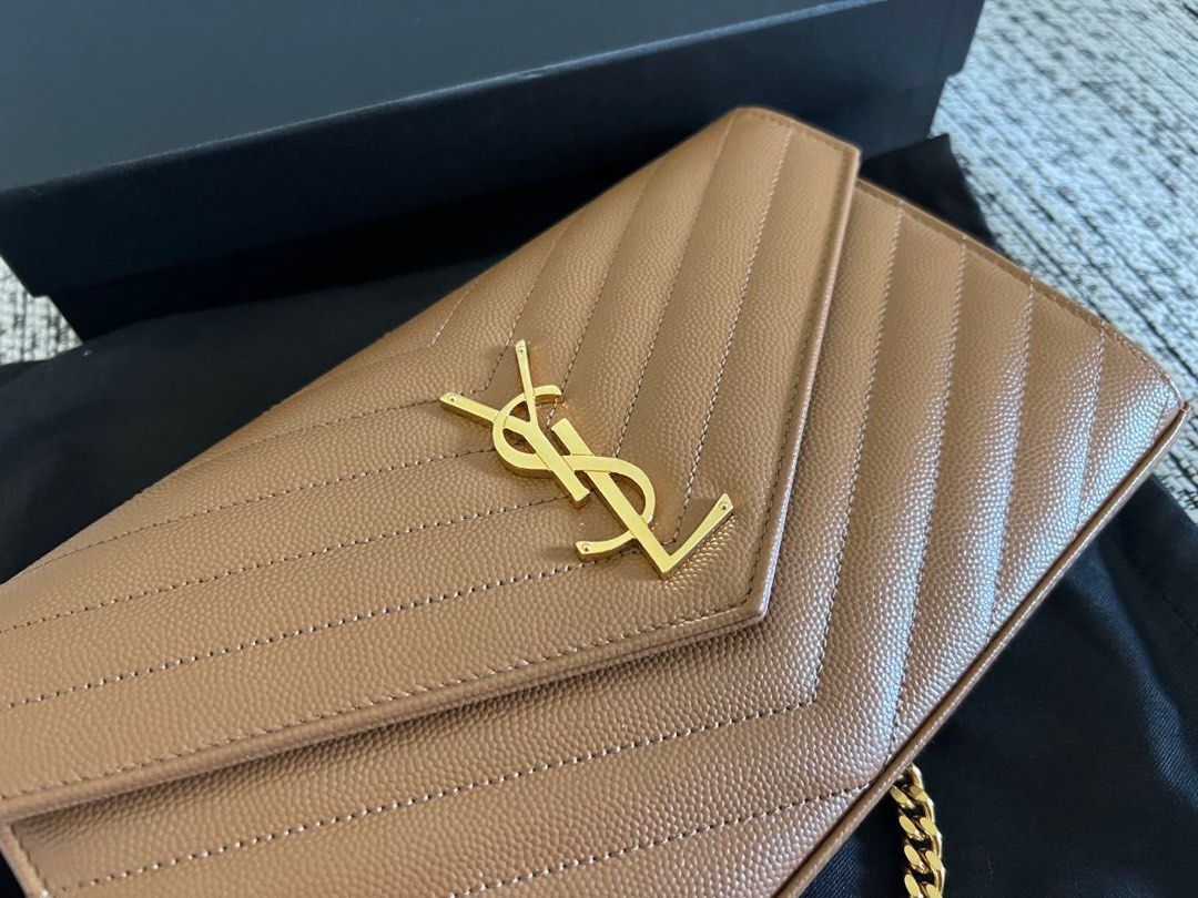 YSL Monogram Bag (Category: Luxury Bags & Wallets) located in Manila. Submitted by dgooodstuff (Listing ID 1241421813, Image 3). Description: YSL Monogram Envelope Crossbody Bag Bought in France, Jan 2023 Complete inclusions - Receipt - Box - Dust Bag Used ONCE for a wedding.