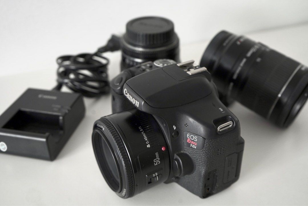 Canon Rebel T6i-750D (Category: Cameras) located in Mandaluyong City. Submitted by kevingnzls (Listing ID 1241627062, Image 2). Description: (Sold as one) 1 Canon Rebel T6i unit 1 Canon 85mm lens 1 kit lens 18-55mm 1 Yungnuo 50mm lens 1 battery 1 battery charger.