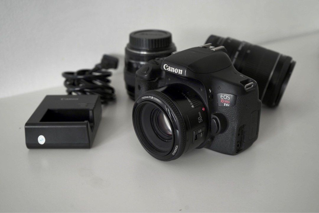 Canon Rebel T6i-750D (Category: Cameras) located in Mandaluyong City. Submitted by kevingnzls (Listing ID 1241627062, Image 1). Description: (Sold as one) 1 Canon Rebel T6i unit 1 Canon 85mm lens 1 kit lens 18-55mm 1 Yungnuo 50mm lens 1 battery 1 battery charger.