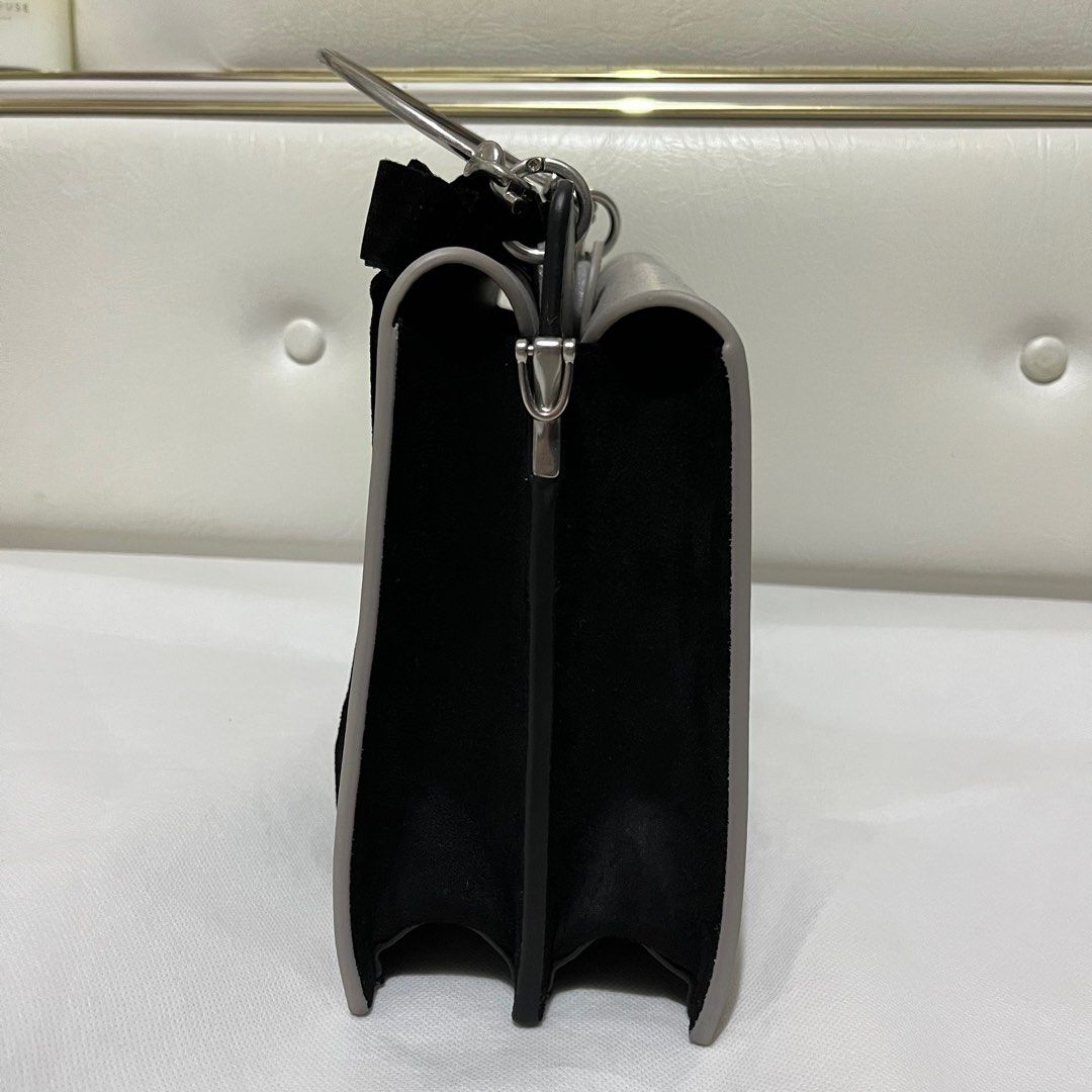 Velvet bow detail top handle bag top