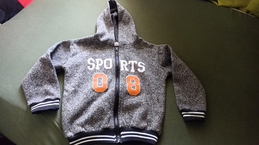 Kids Sports Jacket (Category: Babies & Kids Fashion) located in Quezon City. Submitted by dadiferds (Listing ID 1241578316, Image 1). Description: kids Sports Jacket color acid gray with black & white tripes **Pls see attached photos for the sizes..