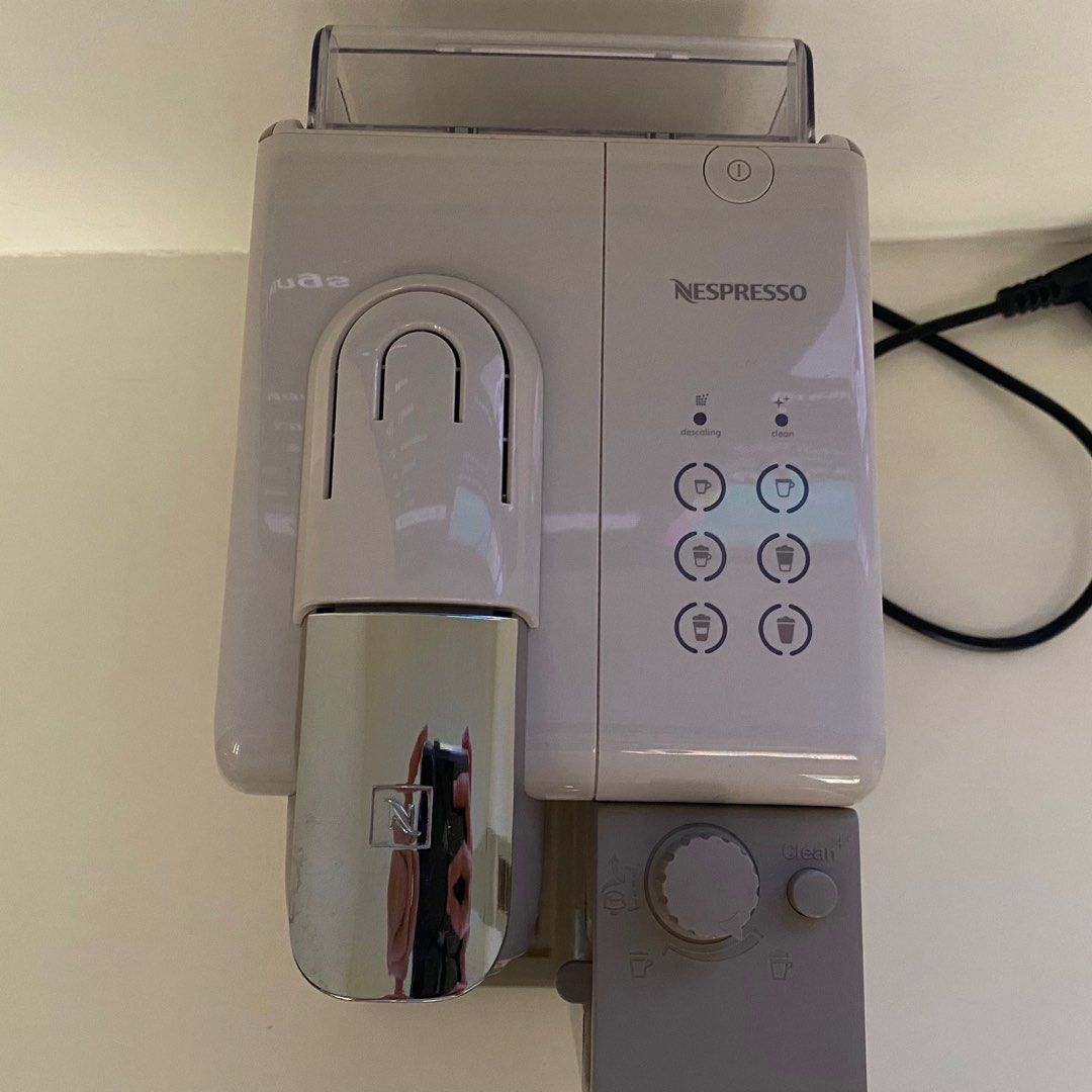 Nespresso lattissima touch reset hot sale